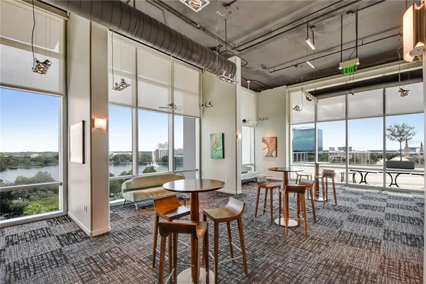 a kitchen with counter top space a sink and cabinets