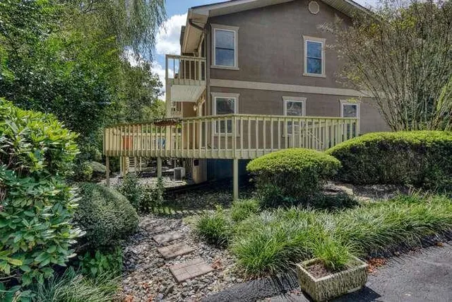 a backyard of a house with lots of green space