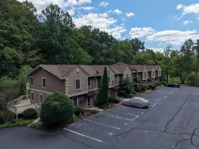 a view of a house with a street