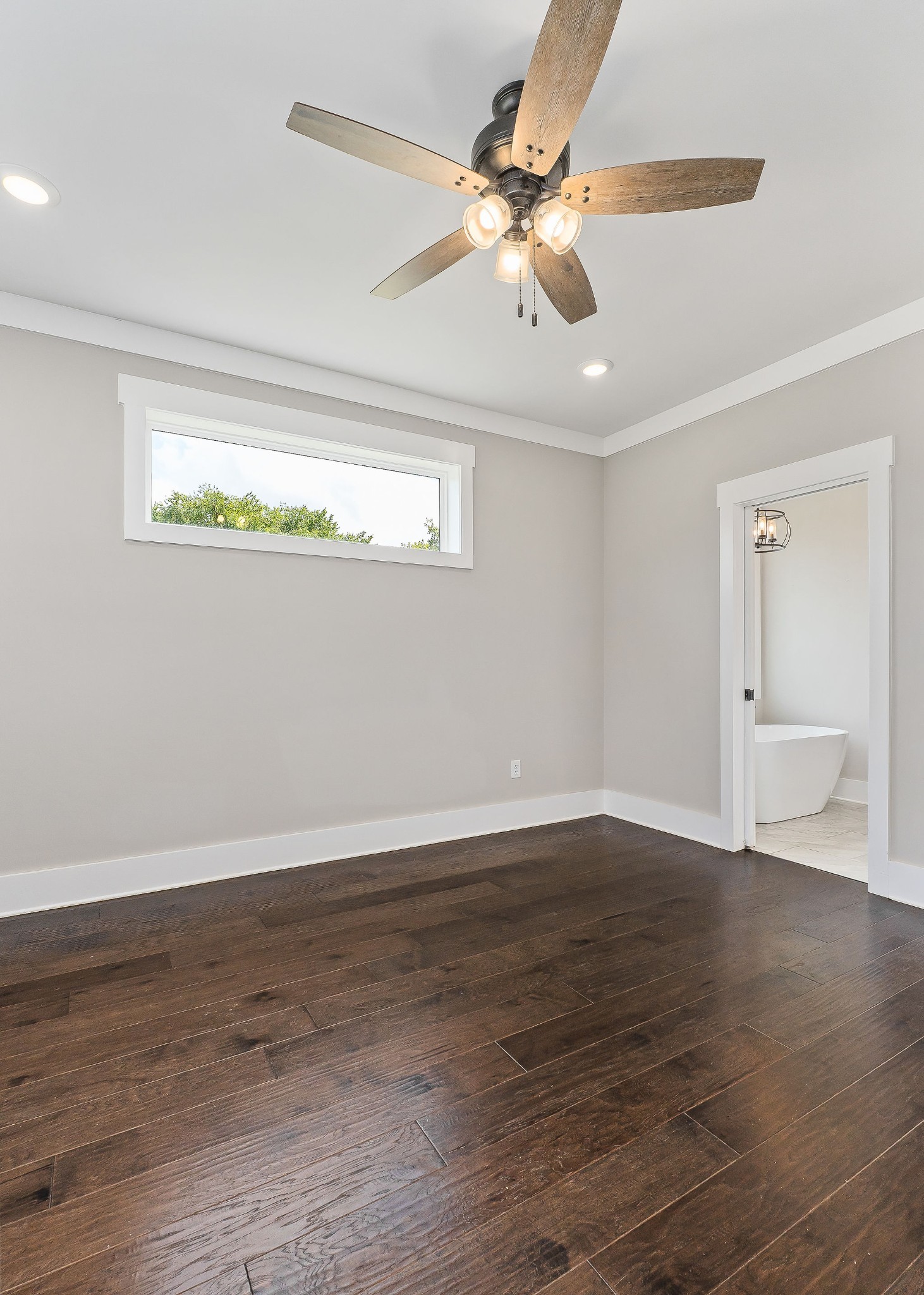 733 Jackson Avenue Carthage, TN 37030 - Photo 18 of 47 a view of a room with wooden floor fan and windows