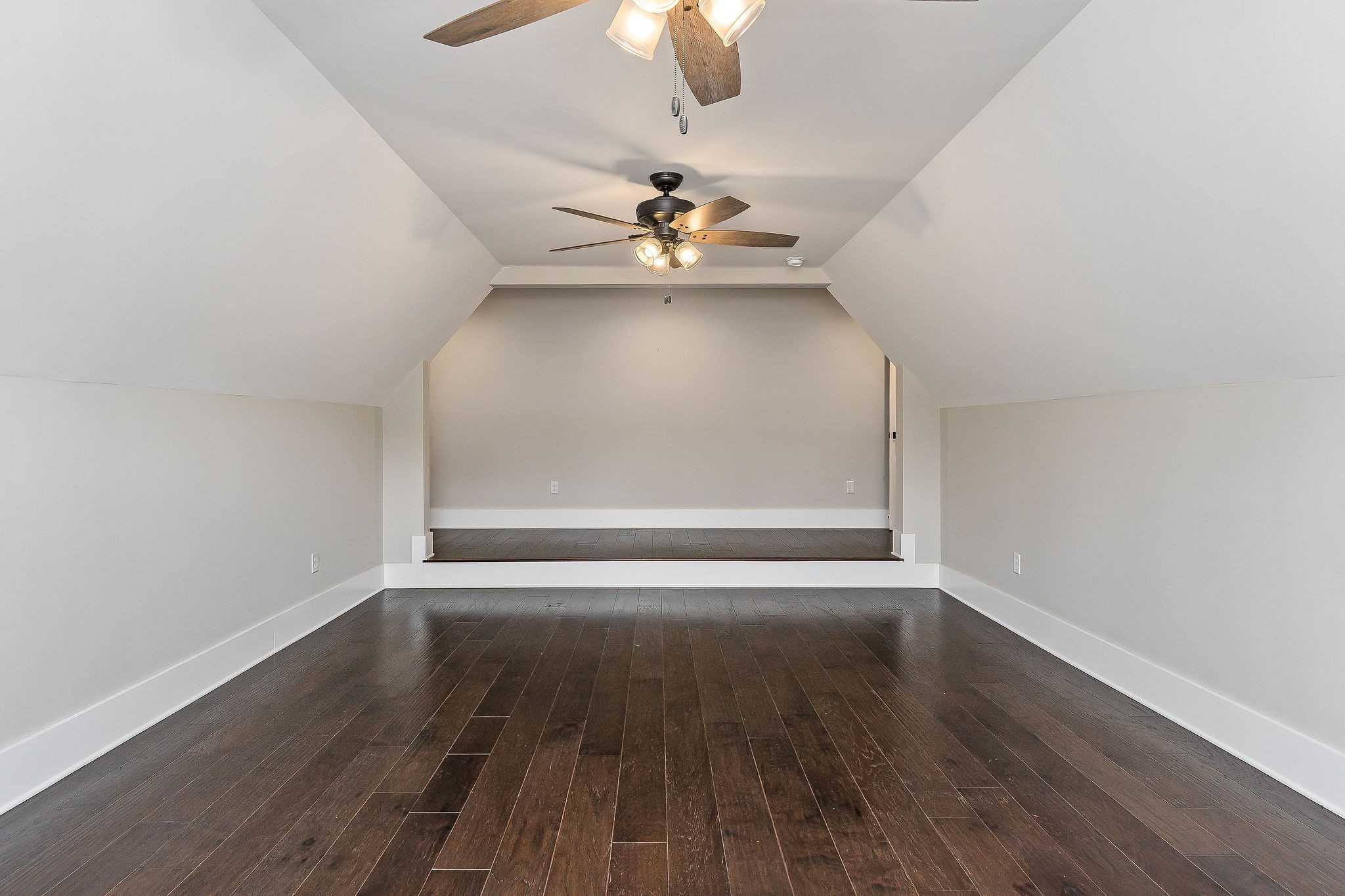 733 Jackson Avenue Carthage, TN 37030 - Photo 2 of 47 a view of a room with wooden floor chandelier fan and windows
