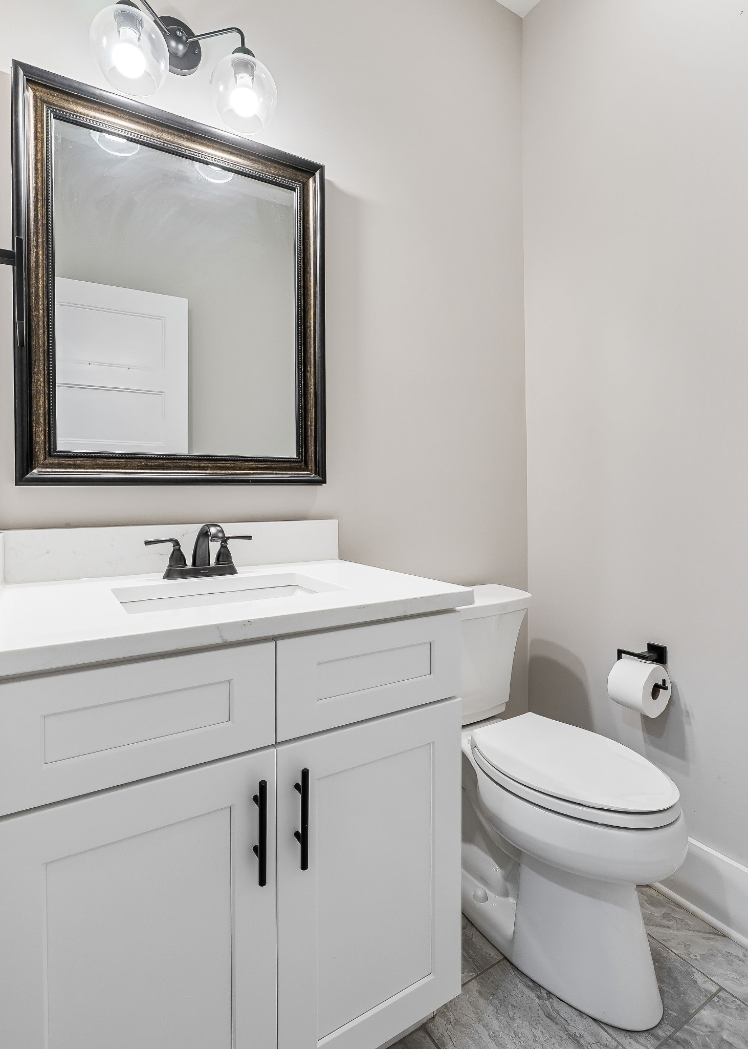 733 Jackson Avenue Carthage, TN 37030 - Photo 29 of 47 a bathroom with a toilet sink and mirror
