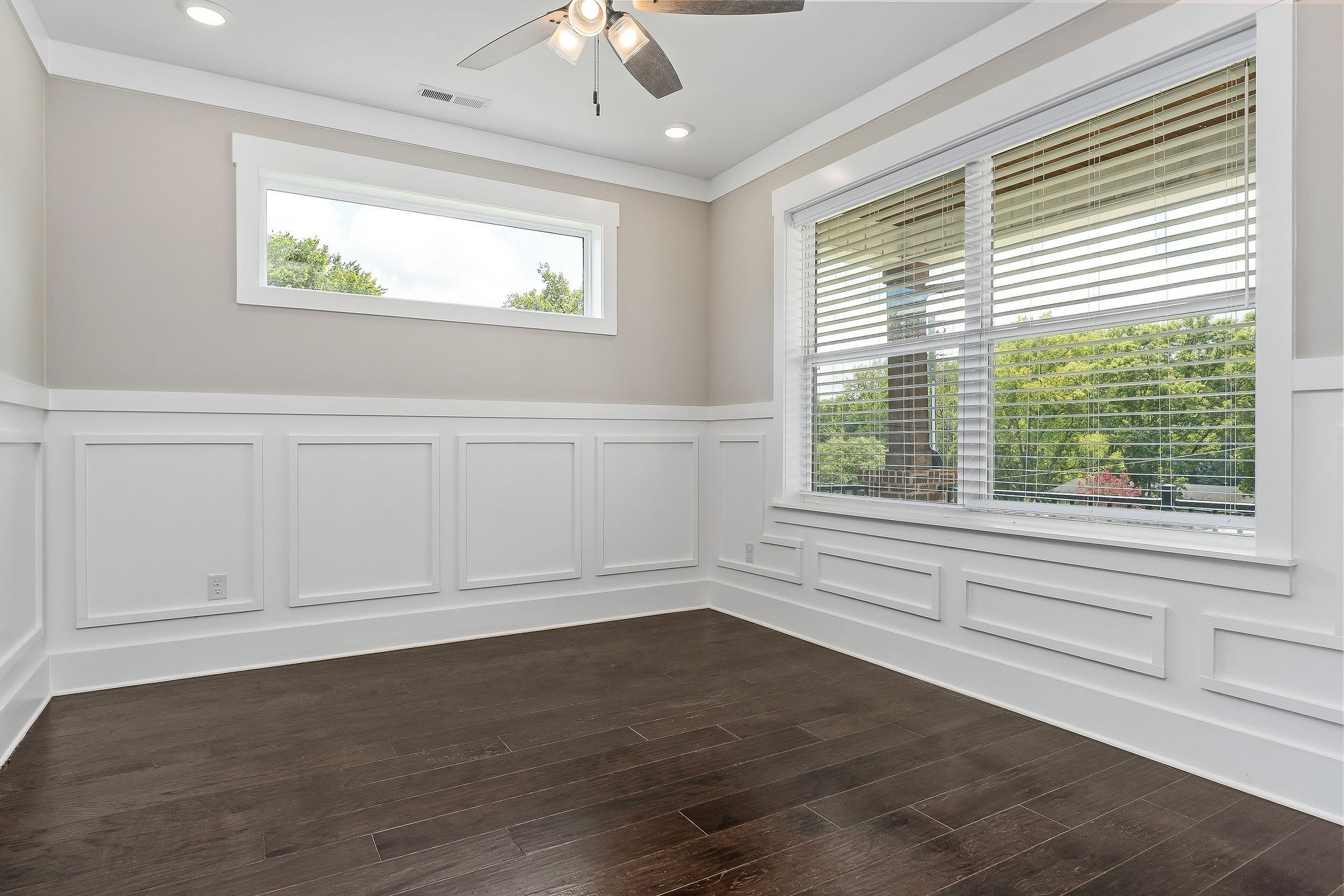 733 Jackson Avenue Carthage, TN 37030 - Photo 35 of 47 an empty room with wooden floor and windows