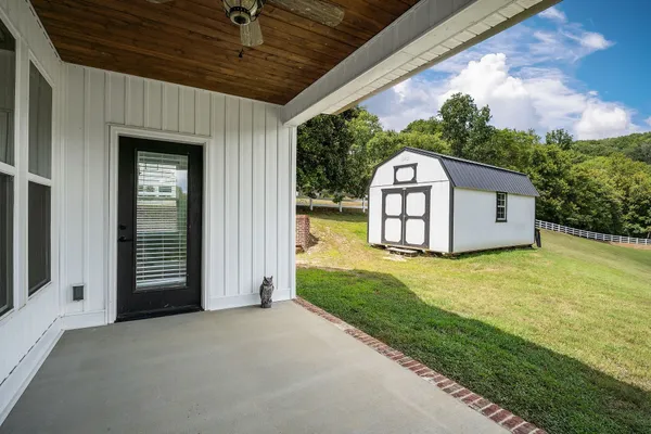 a view of a back yard of the house