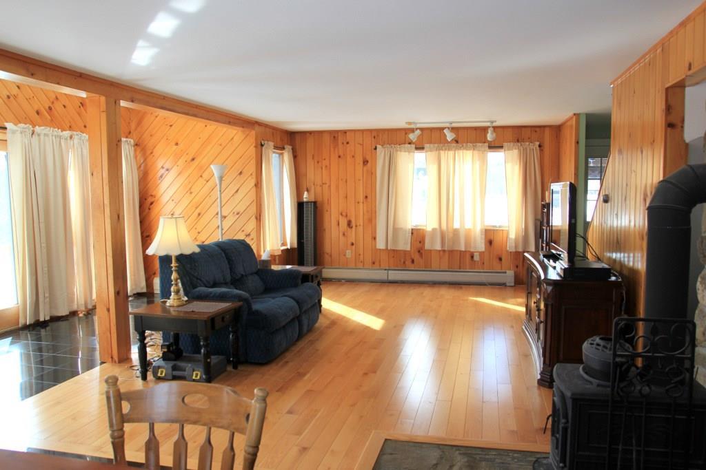118 Clark Road Unity, ME 04988 - Photo 7 of 35 Black Marble Tile and Red Oak flooring