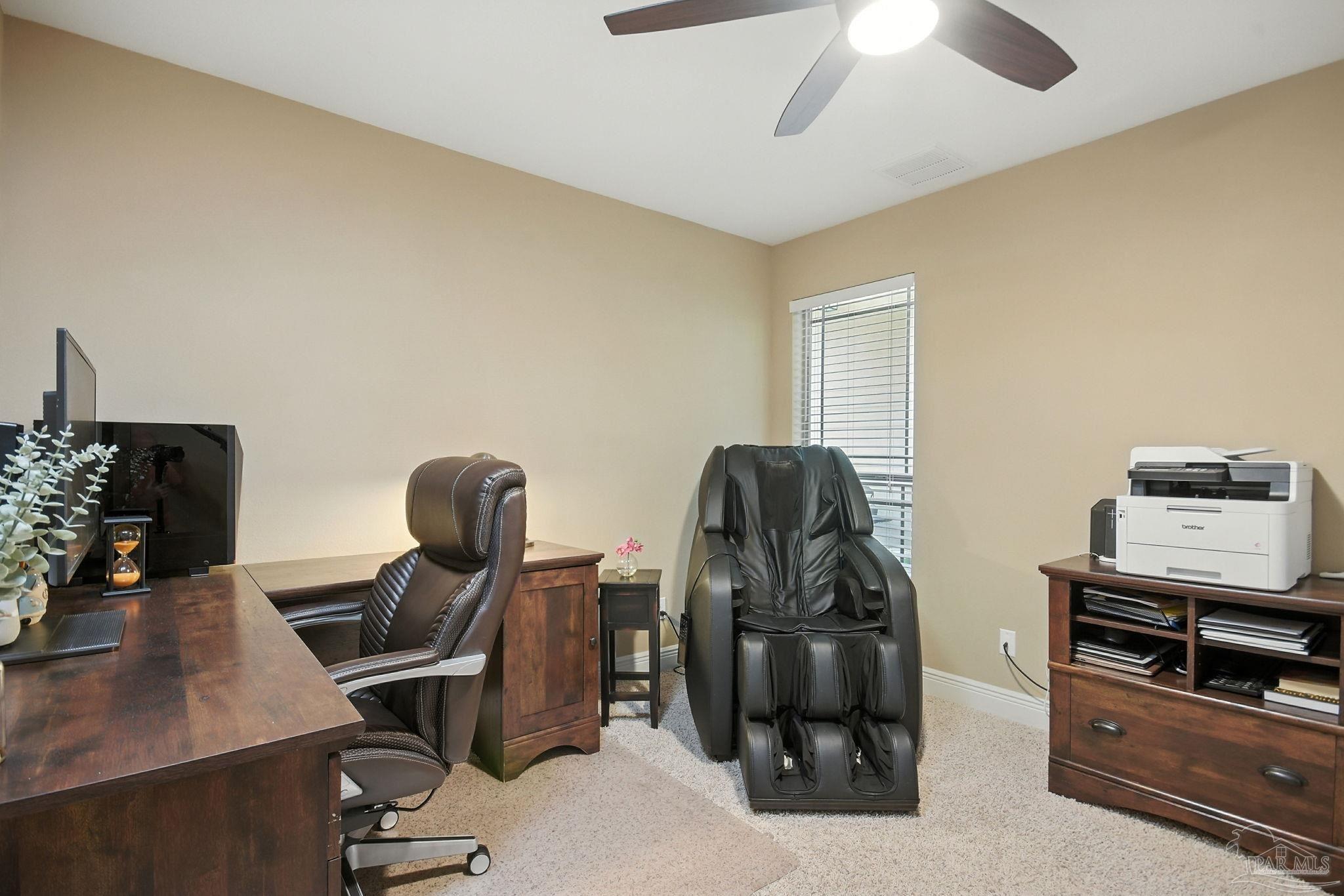 2587 Fiddlers Circle Cantonment, FL 32533 - Photo 43 of 66 a view of workspace with wooden floor windows