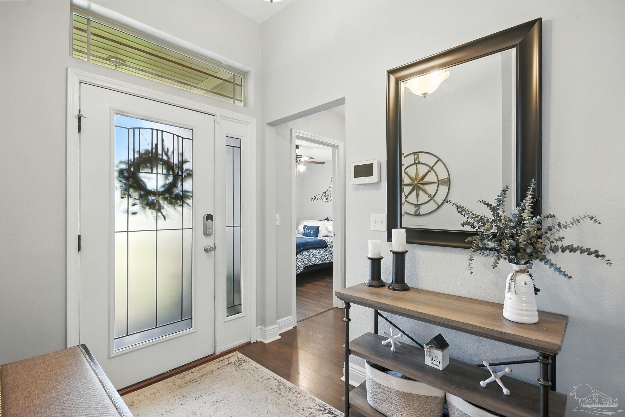 2587 Fiddlers Circle Cantonment, FL 32533 - Photo 7 of 66 a living room with furniture and potted plant