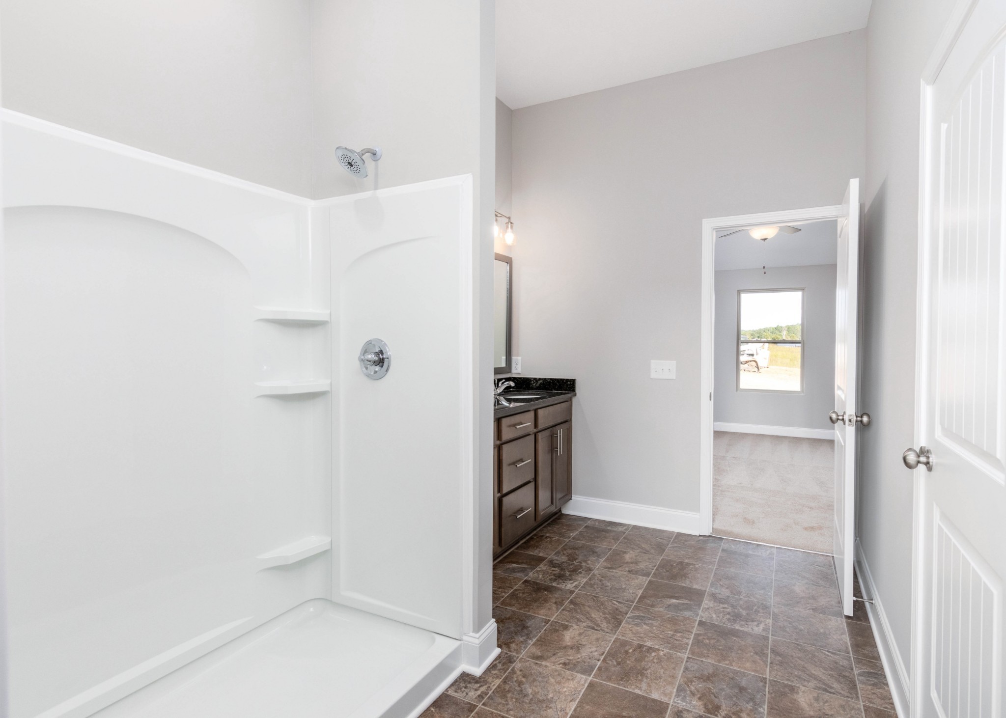 1023 East Piney Road Dickson, TN 37055 - Photo 11 of 19 a bathroom with a shower and a sink