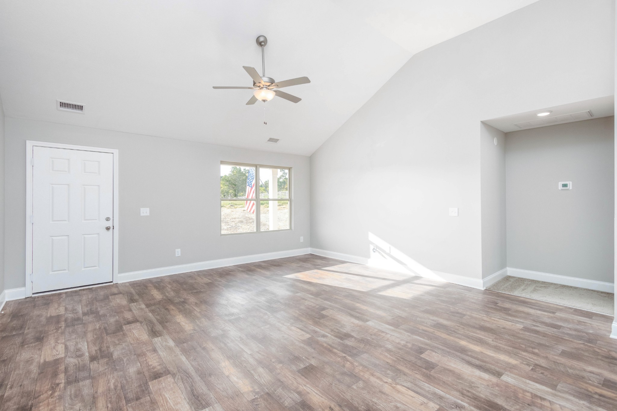 1023 East Piney Road Dickson, TN 37055 - Photo 4 of 19 a view of an empty room with a window