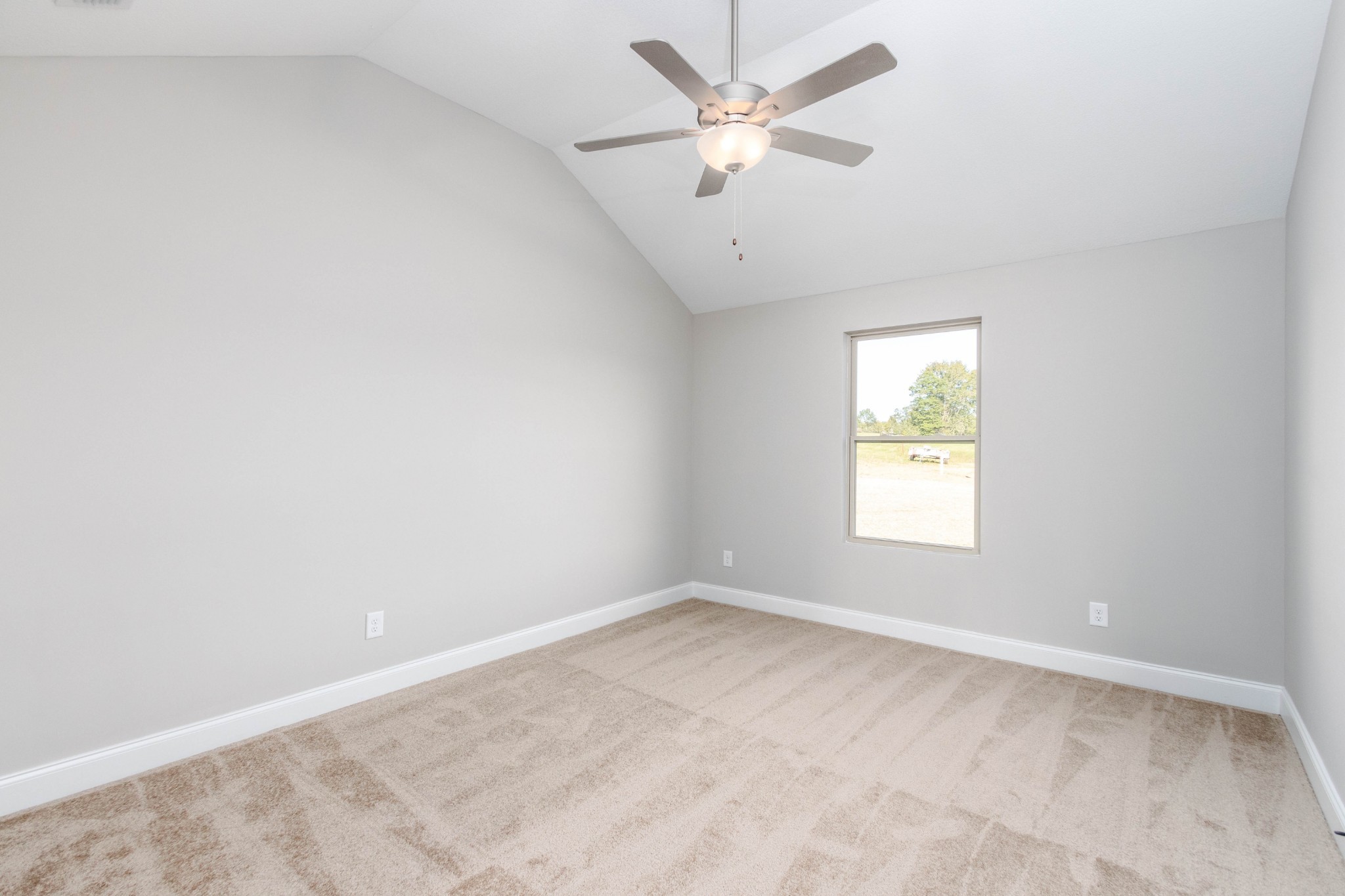 1023 East Piney Road Dickson, TN 37055 - Photo 9 of 19 an empty room with a window