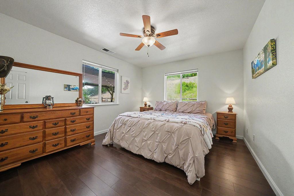 26845 Spring Court Pioneer, CA 95666 - Photo 27 of 89 a bed room with a bed and a dresser