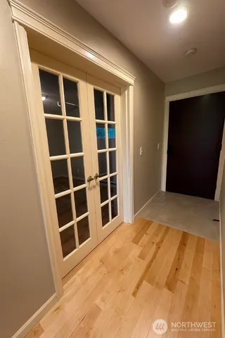 a view of an empty room with empty shelves