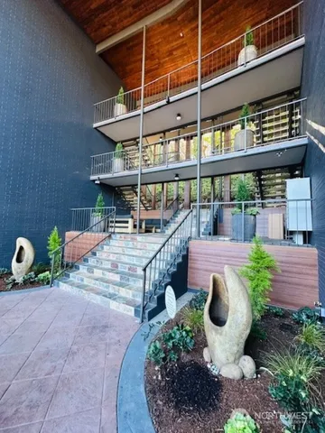 a view of a chair and table in the patio