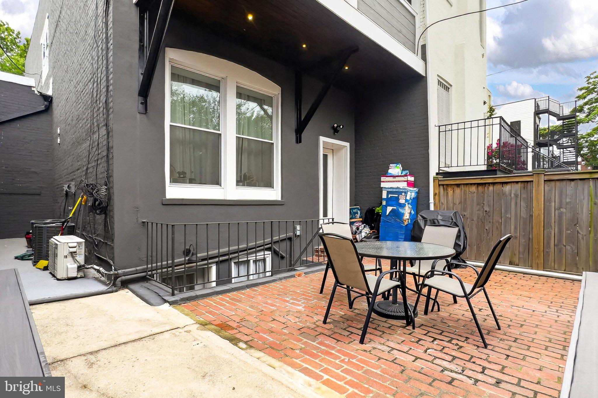 738 11th Street Northeast, Unit 3 Washington, DC 20002 - Photo 27 of 29 Charming patio with brick details.