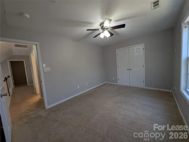 a view of a livingroom with a fan