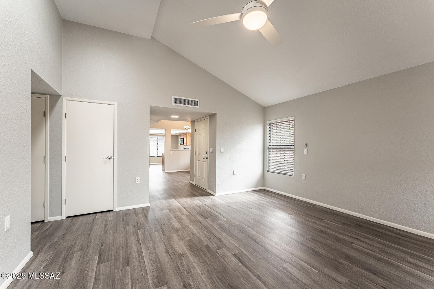 931 West Rio Guaymas Green Valley, AZ 85614 - Photo 20 of 39 wooden floor in an empty room with a window