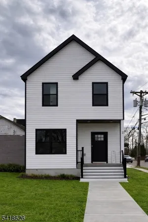 a front view of house with yard
