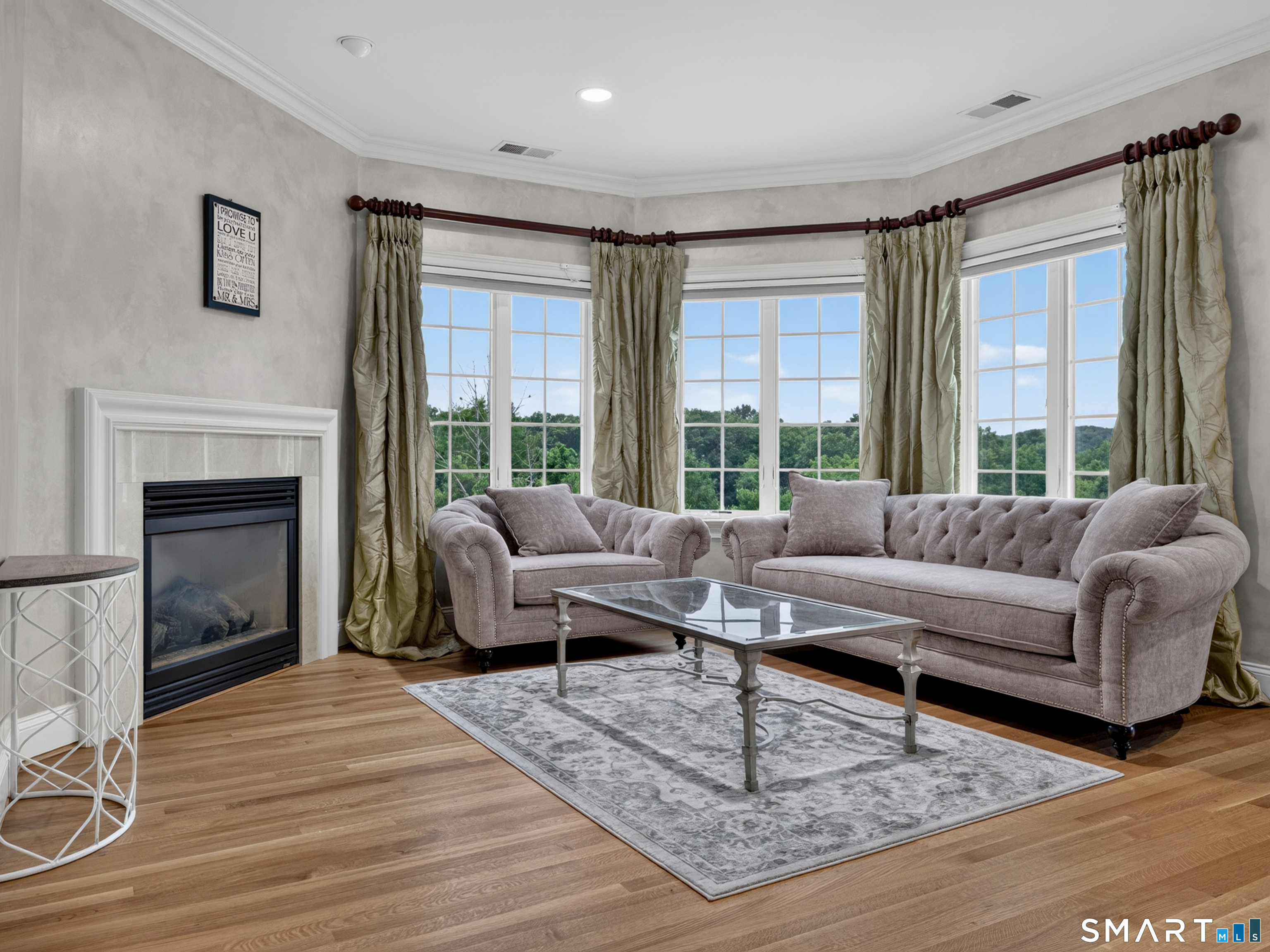 55 Hunters Ridge Rocky Hill, CT 06067 - Photo 21 of 40 a living room with furniture and a fireplace