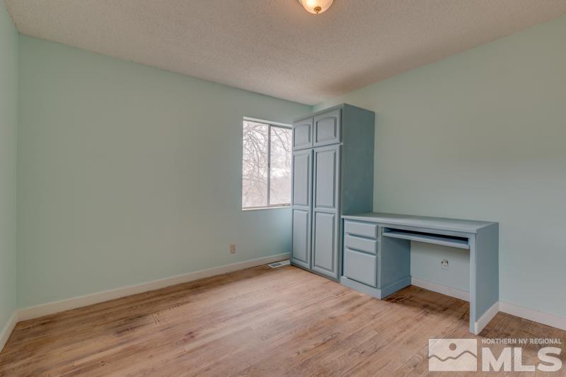 1340 Ralston Street Reno, NV 89503 - Photo 18 of 33 an empty room with closet and windows