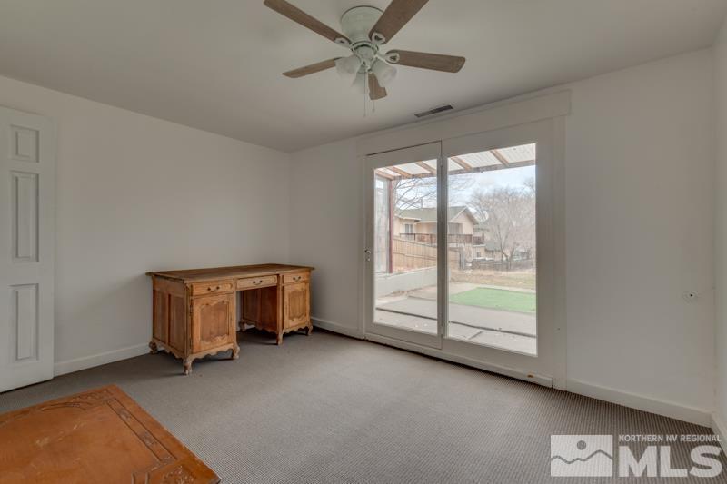 1340 Ralston Street Reno, NV 89503 - Photo 21 of 33 a room with a window and a ceiling fan