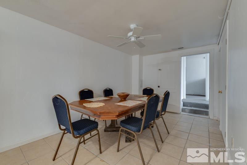 1340 Ralston Street Reno, NV 89503 - Photo 28 of 33 a view of a dining room with furniture and wooden floor