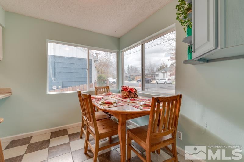 1340 Ralston Street Reno, NV 89503 - Photo 9 of 33 a view of a dining room with furniture window and outside view