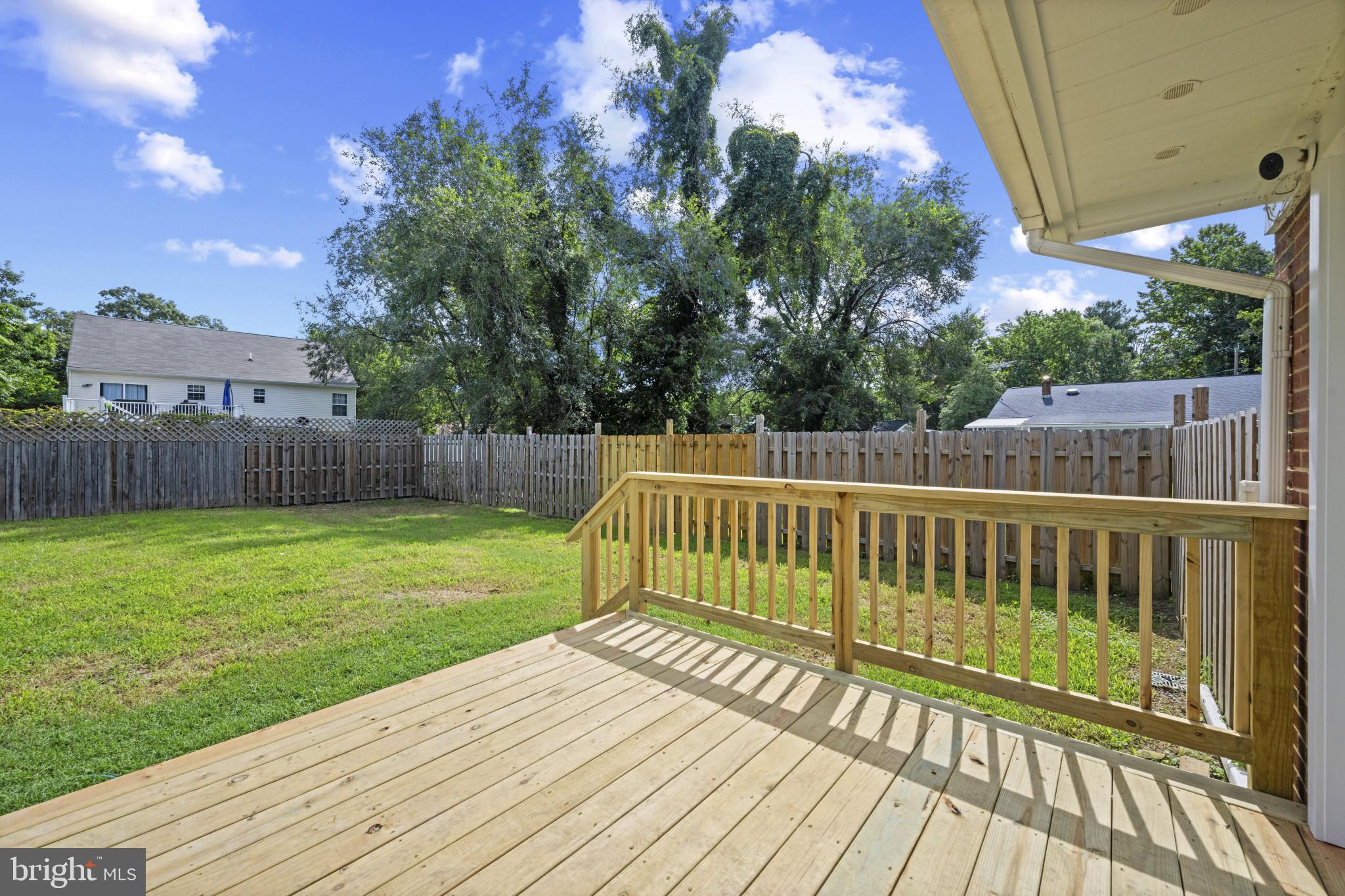 8293 Shilling Road Pasadena, MD 21122 - Photo 12 of 37 New Deck (2025) leading to the pool