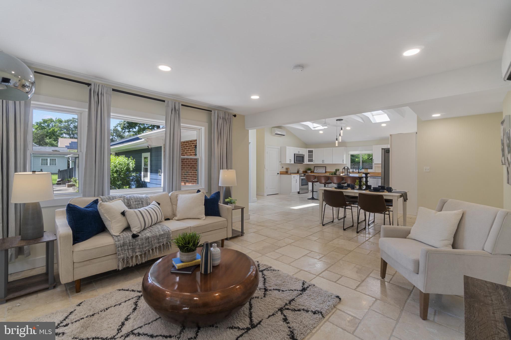 Looking from LR to Kitch. Beautiful stone floors