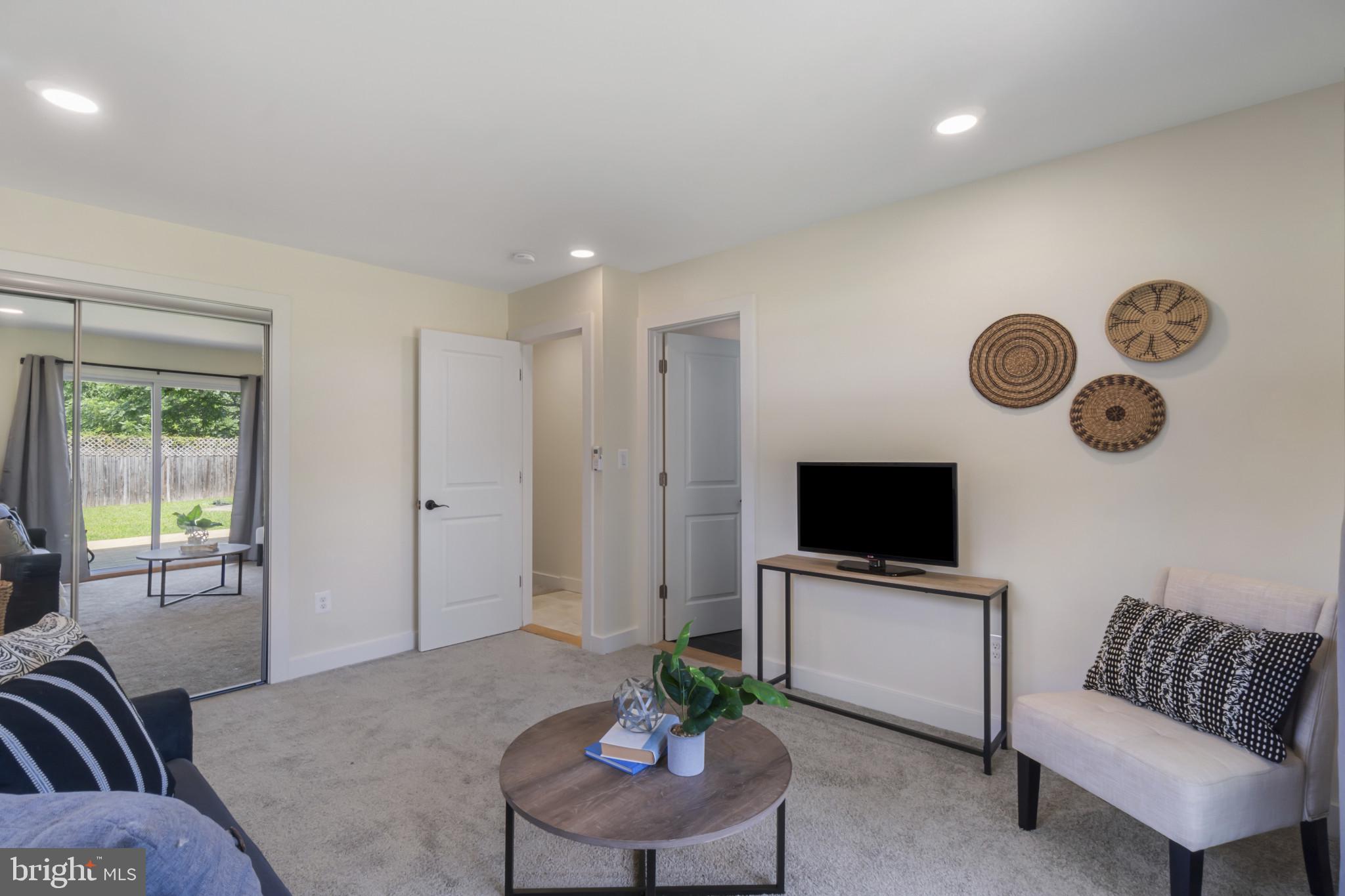 8293 Shilling Road Pasadena, MD 21122 - Photo 10 of 37 Den, with access to the pool
