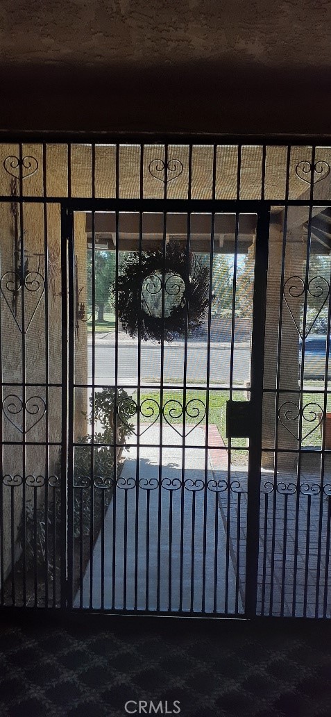 1484 Pepper Tree Drive Hemet, CA 92545 - Photo 8 of 29 Security court yard gate Entrance