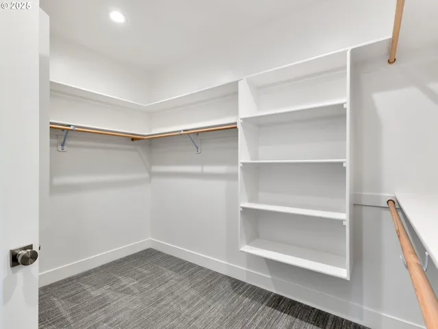 a view of an empty walk in closet