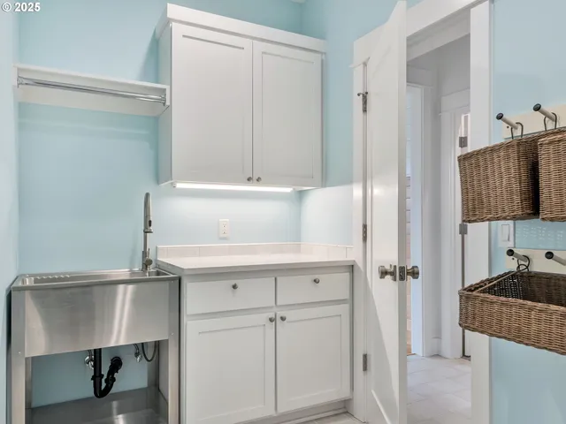 a spacious bedroom with a bed and a window