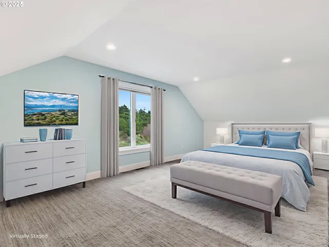 a view of a livingroom with furniture and a garage