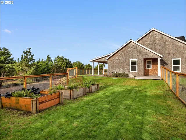 a view of a swimming pool with an outdoor space and lakeside
