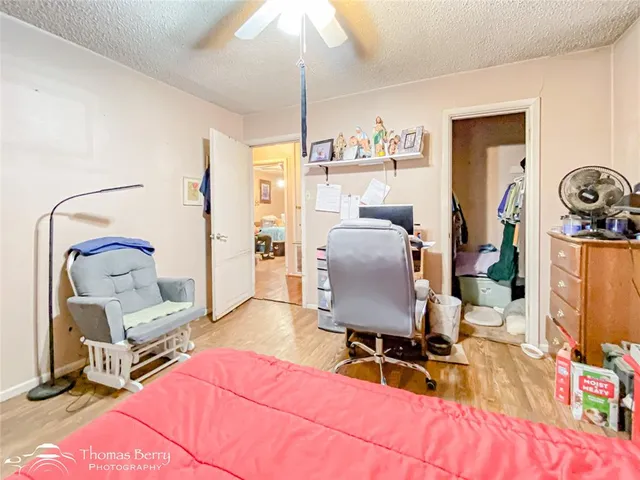 a view of a workspace with furniture and toys