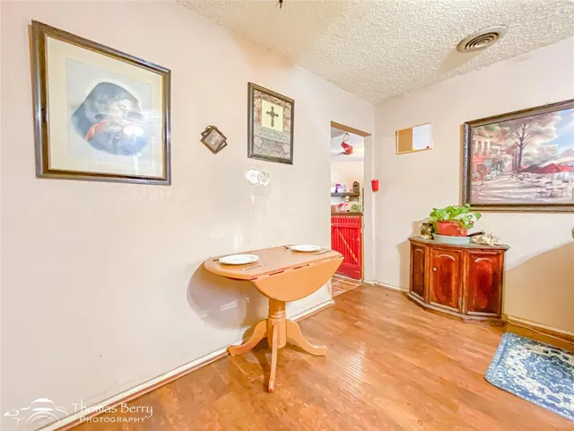 a workspace with furniture and wooden floor