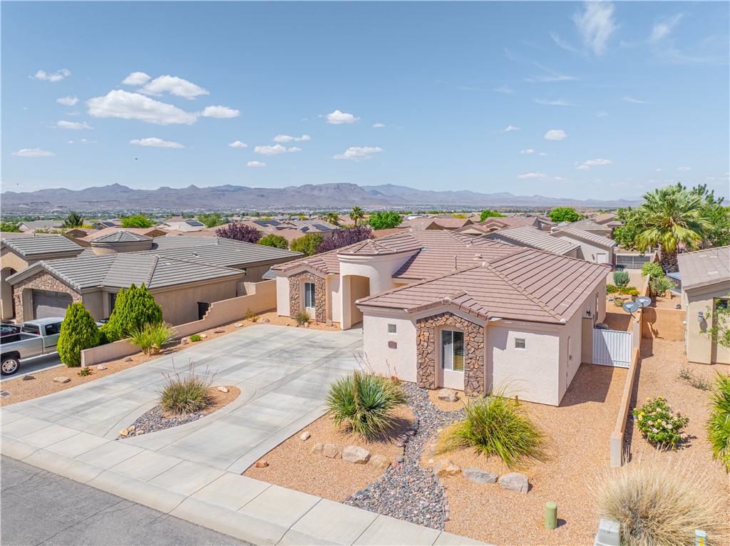 3315 Rainbow Mine Road Kingman, AZ 86401 - Photo 4 of 54 The property features a desert-style landscape with gravel, rocks, and various plants