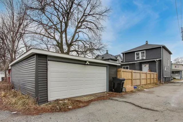 a view of a house with a garage
