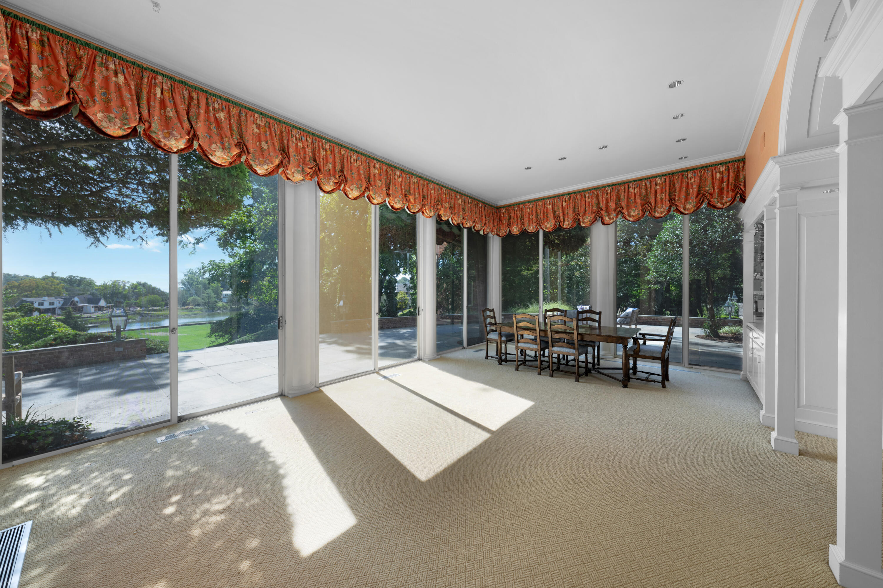 1 Runkenhage Road Darien, CT 06820 - Photo 12 of 33 a view of swimming pool with lawn chairs and couches with wooden fence