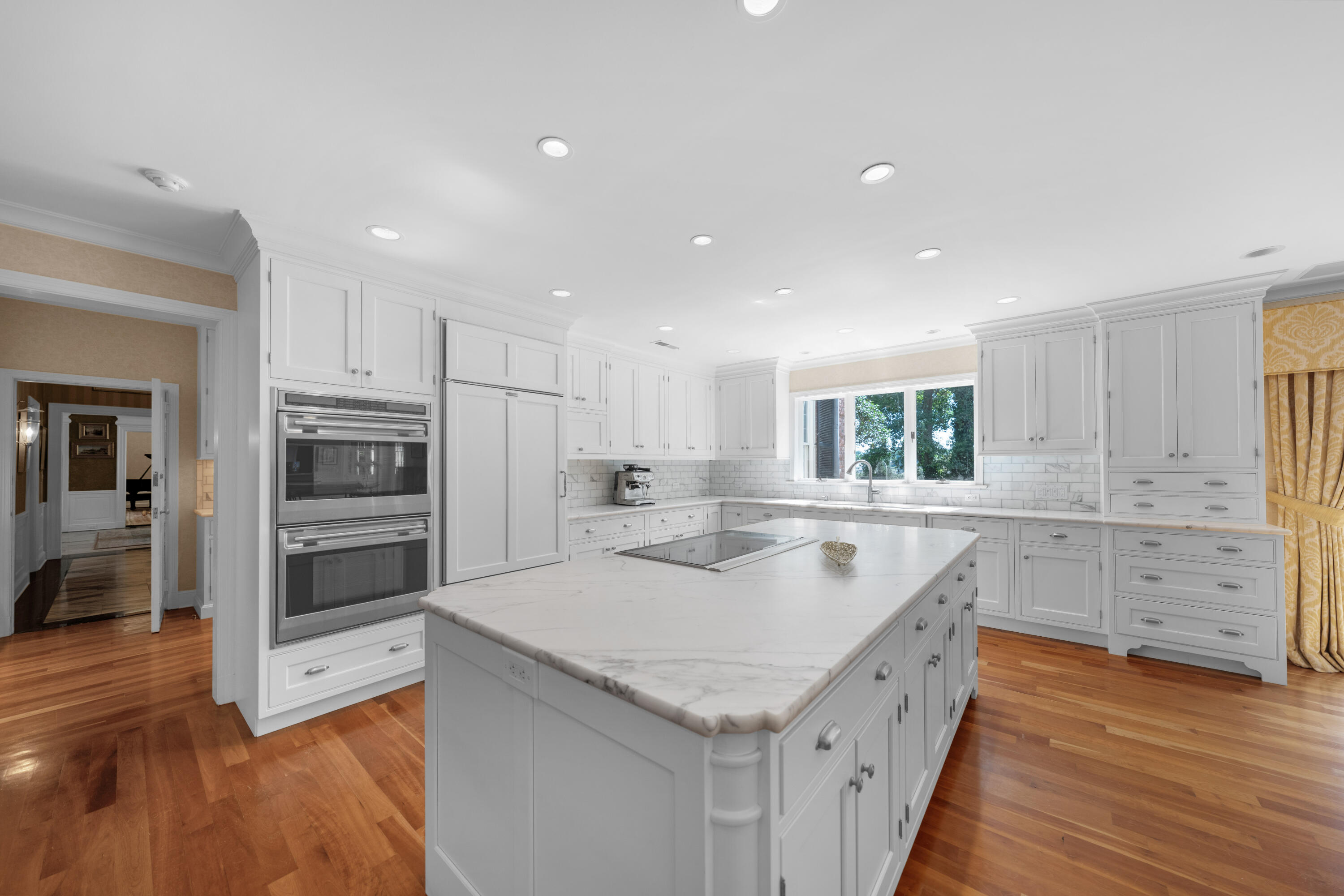 1 Runkenhage Road Darien, CT 06820 - Photo 14 of 33 a kitchen with a sink stove and cabinets