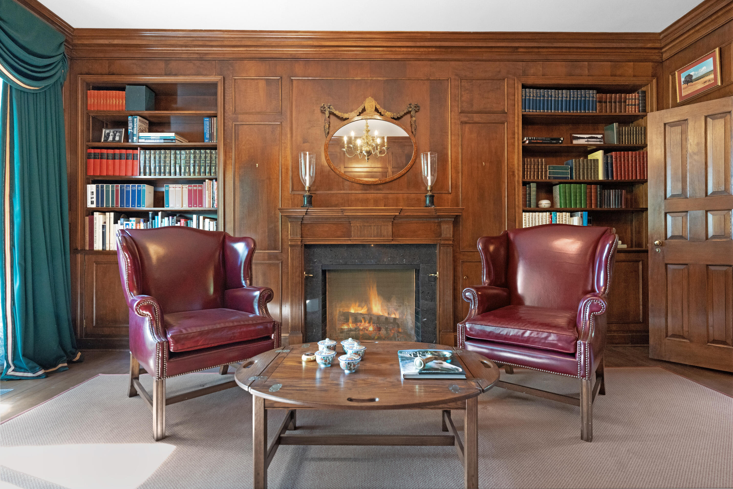1 Runkenhage Road Darien, CT 06820 - Photo 18 of 33 a living room with furniture and a fireplace