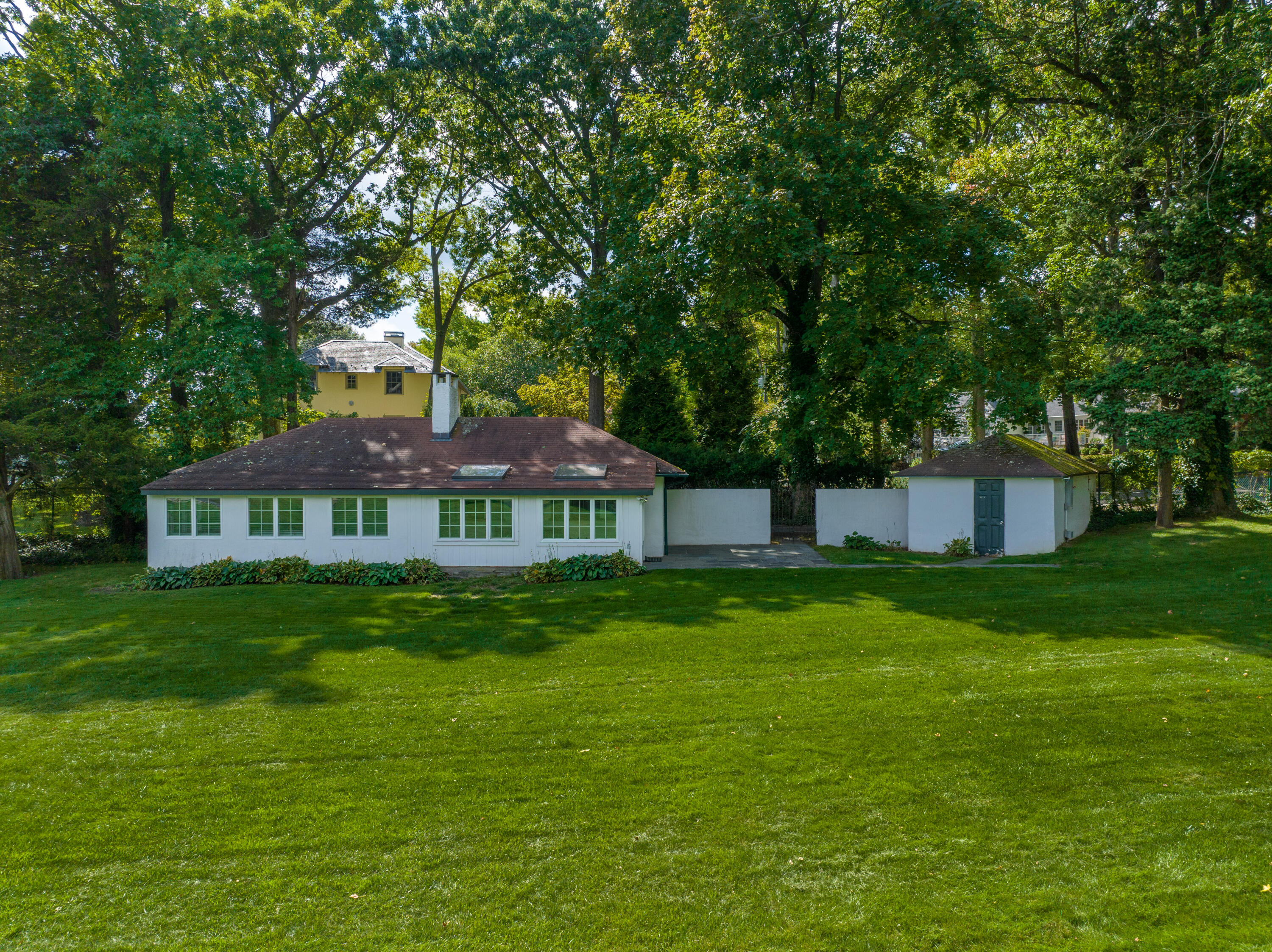 1 Runkenhage Road Darien, CT 06820 - Photo 31 of 33 a front view of a house with a garden