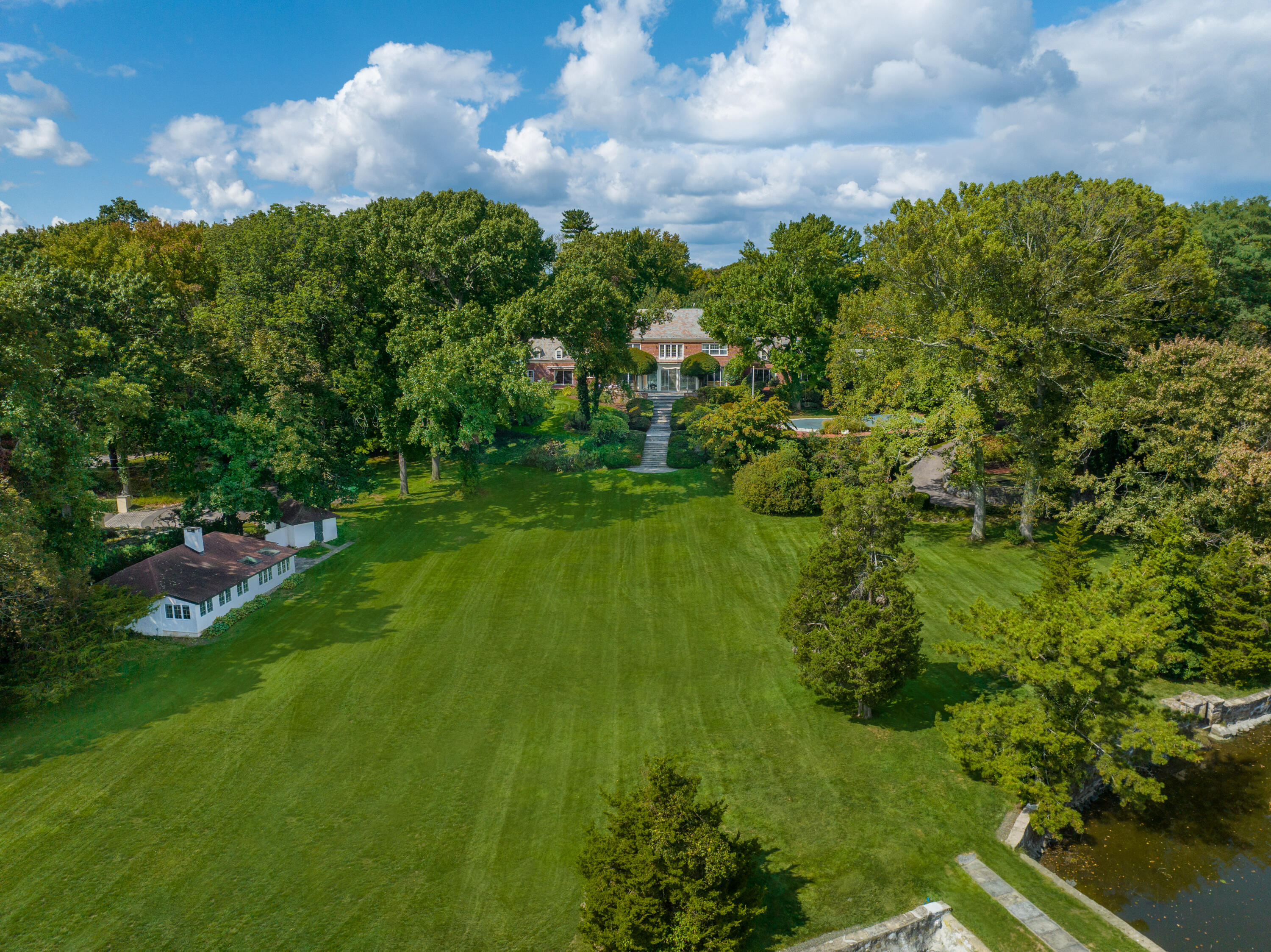 1 Runkenhage Road Darien, CT 06820 - Photo 32 of 33 a lush green forest with lots of trees in it