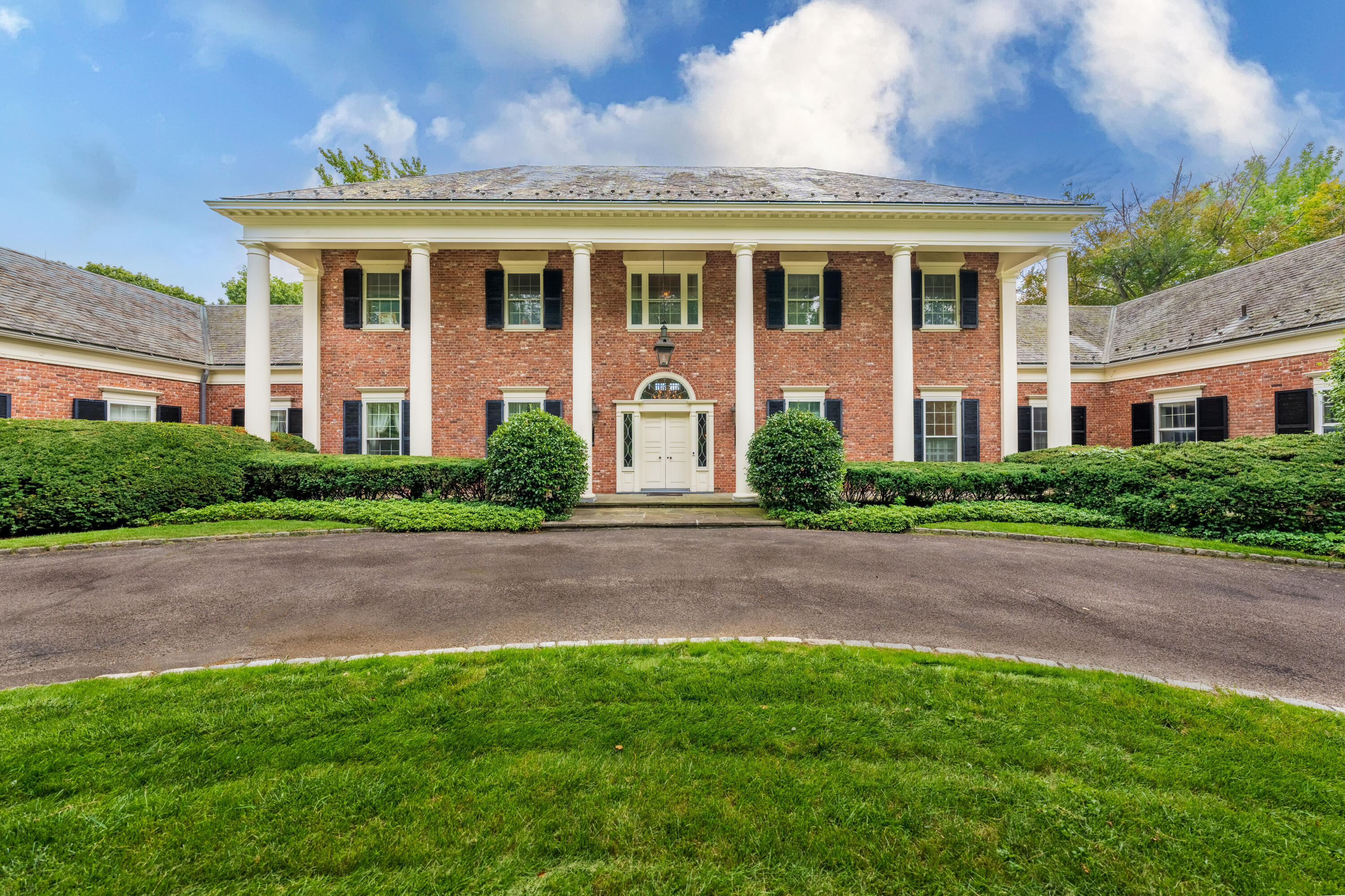 1 Runkenhage Road Darien, CT 06820 - Photo 4 of 33 a front view of house with yard and green space