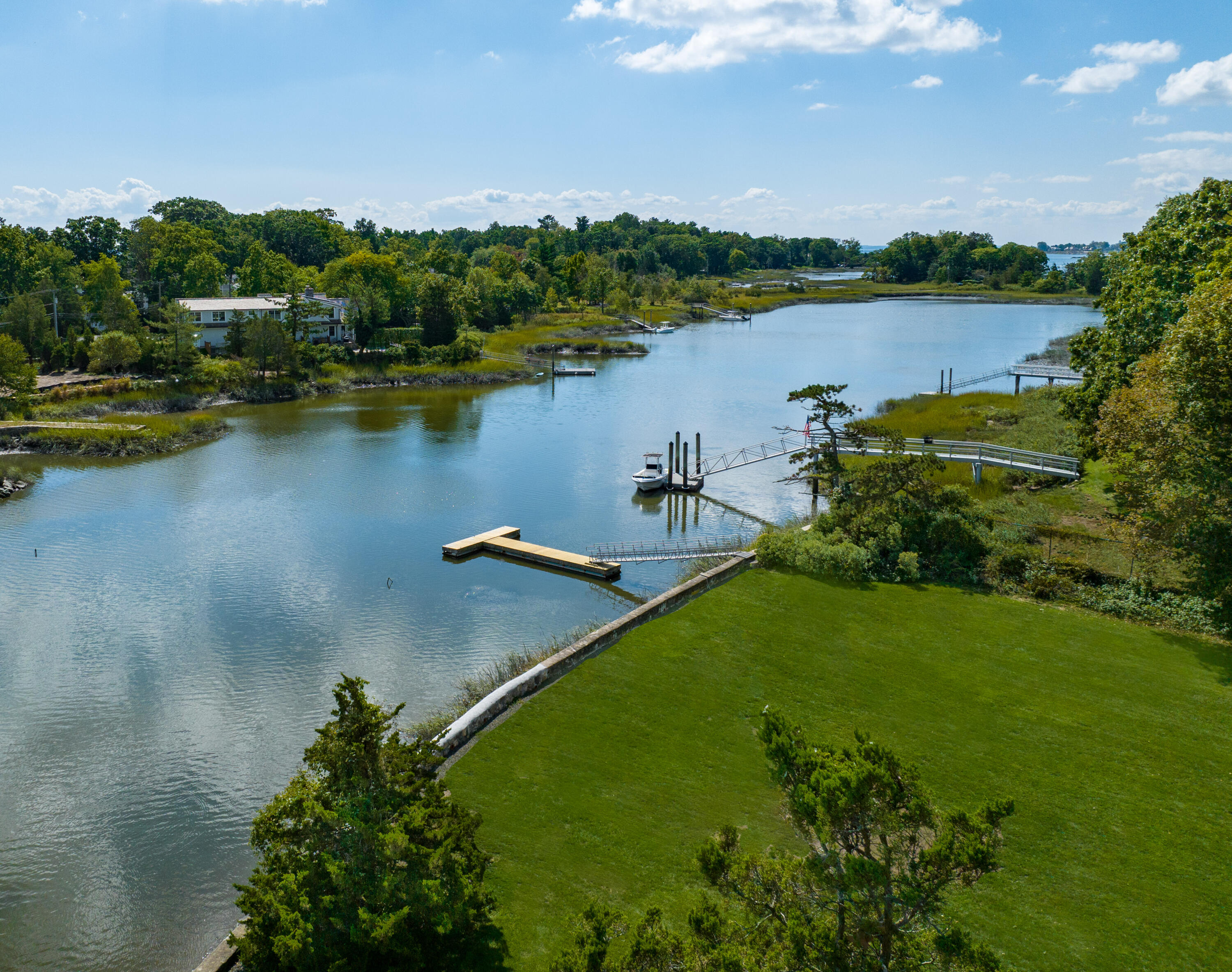 1 Runkenhage Road Darien, CT 06820 - Photo 5 of 33 an aerial view of a houses with a lake view