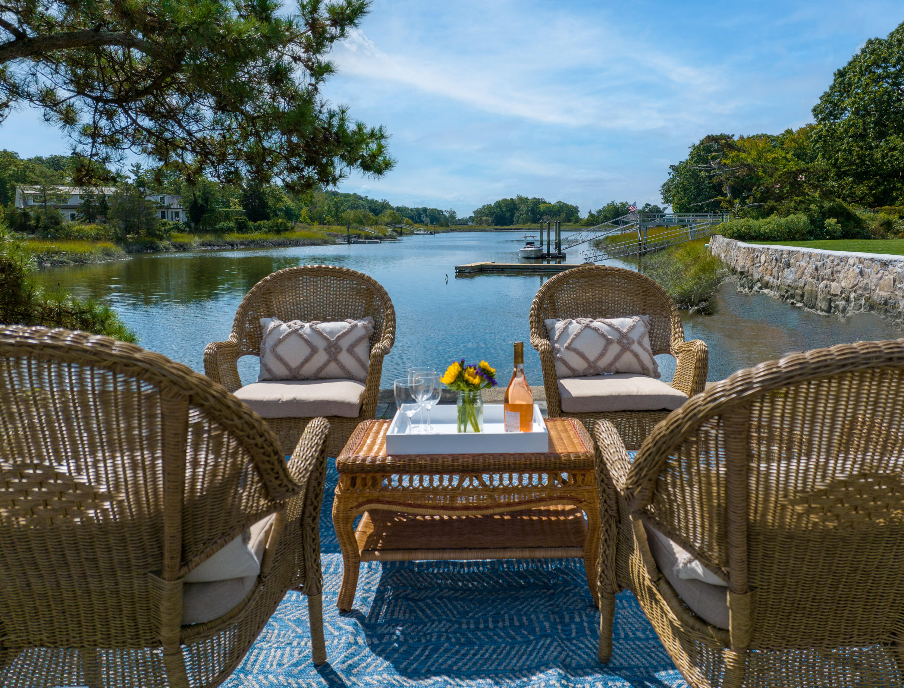 1 Runkenhage Road Darien, CT 06820 - Photo 6 of 33 a view of a balcony with wooden floor and outdoor seating