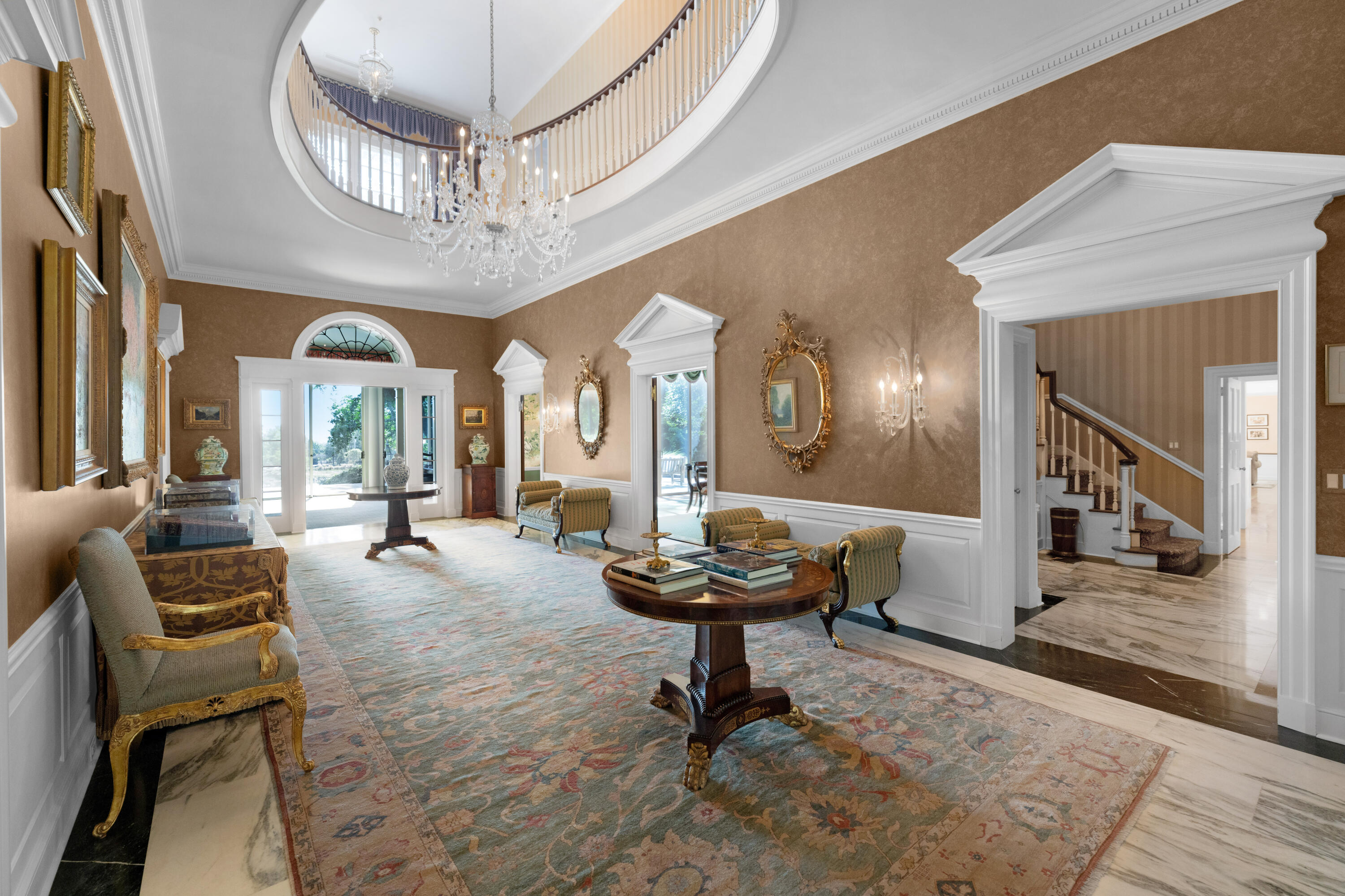 1 Runkenhage Road Darien, CT 06820 - Photo 7 of 33 a living room with furniture and a chandelier