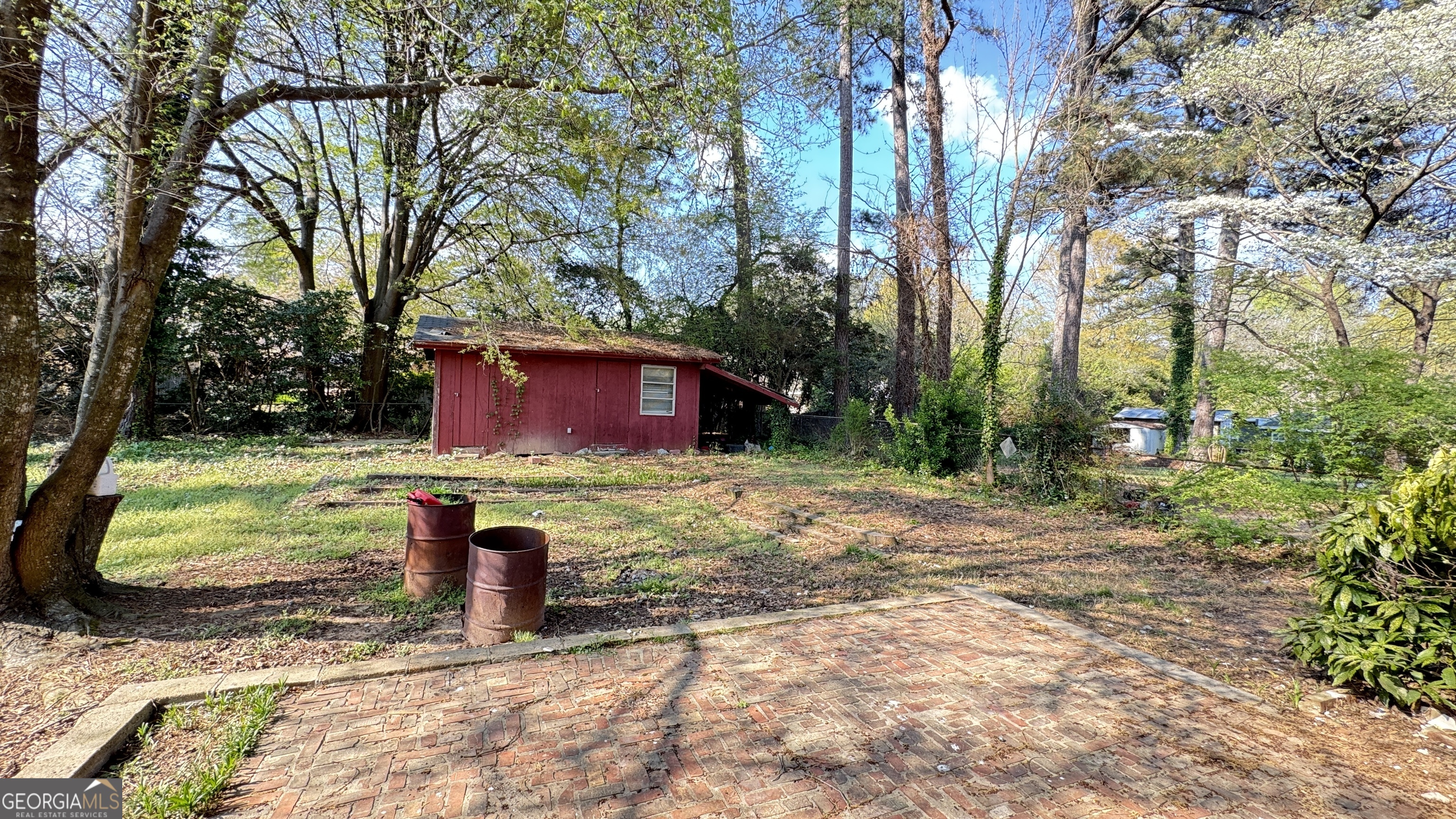 723 Sheffield Road Norcross, GA 30071 - Photo 7 of 8 a fire hydrant in the middle of a yard