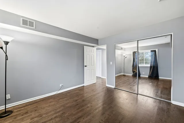 a view of a livingroom with wooden floor