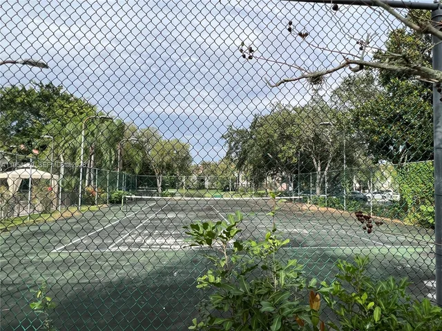 a view of backyard with green space